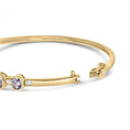 Load image into Gallery viewer, 14K Yellow Gold Alternating Bezel Set 5MM Oval Shaped Tanzanite and 1/5 Cttw Diamond Bangle Bracelet (H-I Color, VS2-SI1 Clarity) - Fit's wrists up to 7.25" Inches
