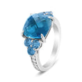 Load image into Gallery viewer, 18K White Gold 10mm Cushion Shaped Blue Topaz and 1/6 Cttw Diamond 3 Stone Style Ring (F-G Color, VS1-VS2 Clarity)