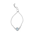 Load image into Gallery viewer, .925 Sterling Silver 10x8mm Oval Blue Topaz and Diamond Accent Lariat 4”-10” Adjustable Bolo Bracelet (H-I Color, SI1-SI2 Clarity)