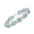 Load image into Gallery viewer, .925 Sterling Silver 7x7 mm Cushion Cut Blue Topaz and 1/10 Ctw Single Cut Diamond Square Shape Tennis Bracelet (I-J Color, I1-I2 Clarity) - 7"
