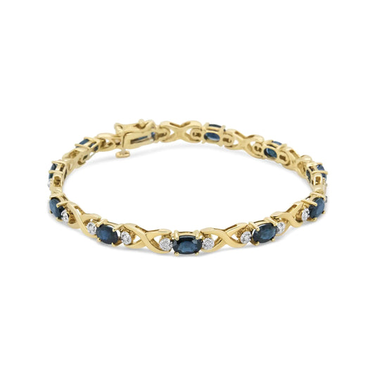 14K Yellow Gold 1 1/4 Cttw Round Diamond and 6x4mm Blue Sapphire "X" Link Bracelet (I-J Color, I1-I2 Clarity)- Size 7"