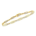 Load image into Gallery viewer, 14K Yellow Gold 1-1/2 Cttw Round Brilliant-Cut & Baguette Cut Diamond Bezel and Tapered Link 7" Tennis Bracelet (H-I Color, I1-I2 Clarity)
